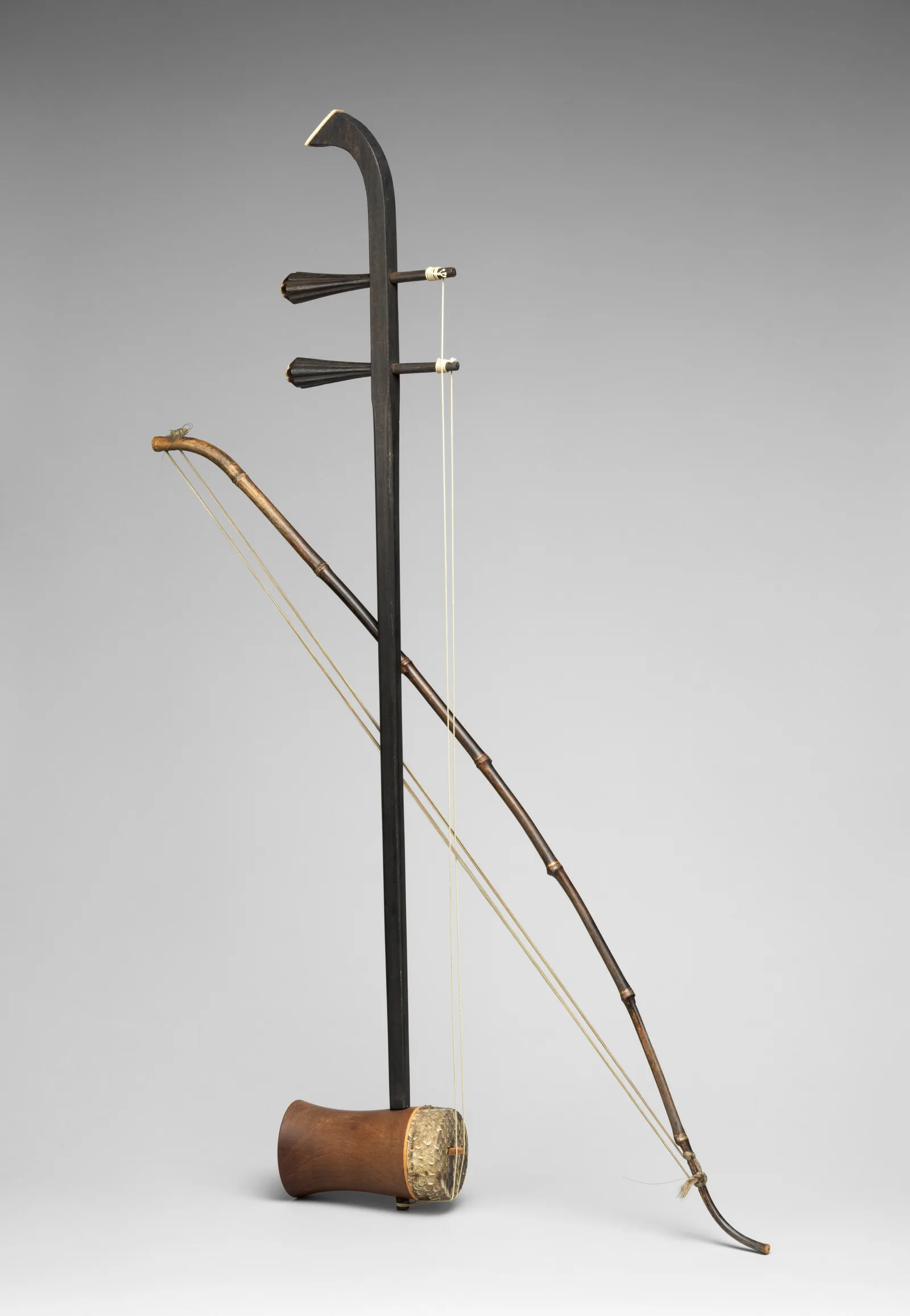 An erhu, a two-stringed Chinese bowed fiddle, photographed for a museum catalogue